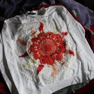 Upcycled White Sweatshirt with Intricate patchwork Sun Design